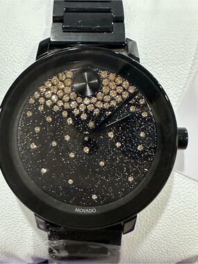 Movado Black Watch with Gold Crystal Accents
